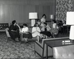 Students on sofas in lounge