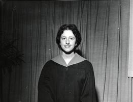 Member of first graduating class Judith Ochs in gown