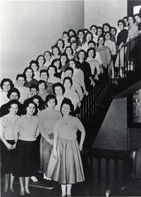 Freshmen of Class of 1962 posing on stairs