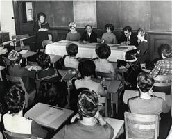 Students at event with  Dean Norman Frimer, Director of Student Activities Esther Auerbach, and others