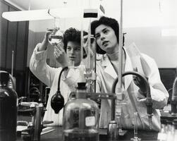 Two students in chemistry lab