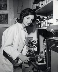 Student in  science lab with equipment