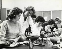 Students with Professor of Biology Phyllis Cahn in lab