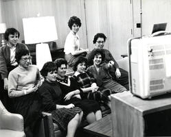 Students in lounge viewing television