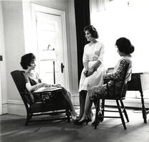 Three students talking