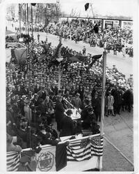 View of speaker's podium and attendees (looking north on Amsterdam Avenue) at cornerstone laying ceremony for Yeshiva College