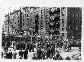 View of crowds on Amsterdam Avenue and 187th Street at cornerstone laying ceremony for Yeshiva College